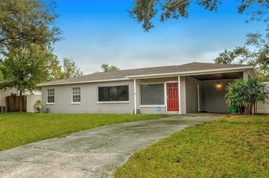 Under contract-accepting backup offers. Fore! This mid-century on Babe Zaharias Golf Course in Florida - for sale on GolfHomes.com, golf home, golf lot