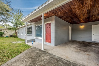 Under contract-accepting backup offers. Fore! This mid-century on Babe Zaharias Golf Course in Florida - for sale on GolfHomes.com, golf home, golf lot