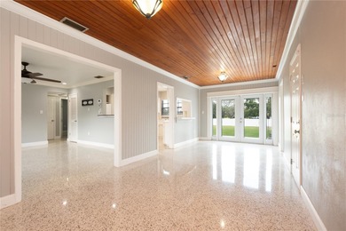 Under contract-accepting backup offers. Fore! This mid-century on Babe Zaharias Golf Course in Florida - for sale on GolfHomes.com, golf home, golf lot