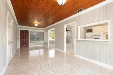 Under contract-accepting backup offers. Fore! This mid-century on Babe Zaharias Golf Course in Florida - for sale on GolfHomes.com, golf home, golf lot