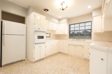 Under contract-accepting backup offers. Fore! This mid-century on Babe Zaharias Golf Course in Florida - for sale on GolfHomes.com, golf home, golf lot