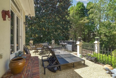 This elegant home with stunning finishes is nestled privately on on Woodside Plantation Country Club in South Carolina - for sale on GolfHomes.com, golf home, golf lot