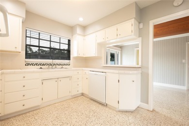 Under contract-accepting backup offers. Fore! This mid-century on Babe Zaharias Golf Course in Florida - for sale on GolfHomes.com, golf home, golf lot