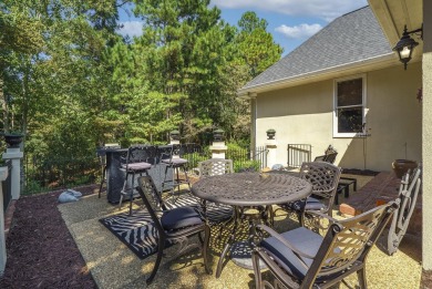 This elegant home with stunning finishes is nestled privately on on Woodside Plantation Country Club in South Carolina - for sale on GolfHomes.com, golf home, golf lot