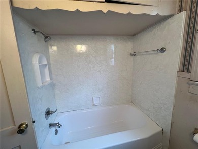 Location! Location! Location! Two-bedroom, one-bath home on Querbes Park Golf Course in Louisiana - for sale on GolfHomes.com, golf home, golf lot