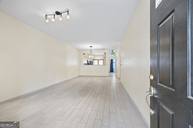 Freshly updated & priced to sell! Charming 2-story townhome in on Collins Hill Golf Club in Georgia - for sale on GolfHomes.com, golf home, golf lot