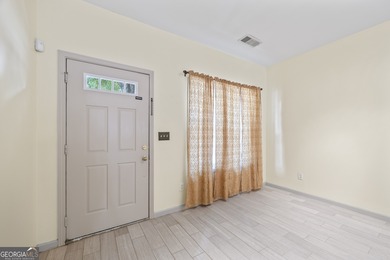 Freshly updated & priced to sell! Charming 2-story townhome in on Collins Hill Golf Club in Georgia - for sale on GolfHomes.com, golf home, golf lot