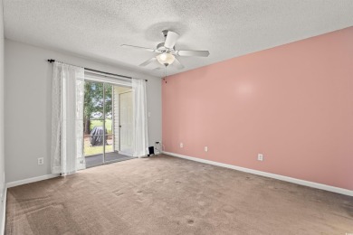 This great first floor unit, with a large screened in back porch on  in South Carolina - for sale on GolfHomes.com, golf home, golf lot