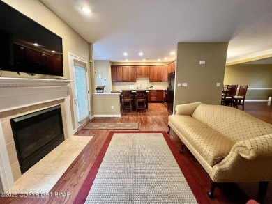 Welcome to this stunning condominium in the desirable Country on Country Club of the Poconos Golf Course in Pennsylvania - for sale on GolfHomes.com, golf home, golf lot