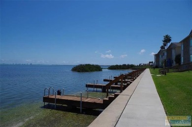 Welcome to coastal living! Beautiful gated bayfront community on South Padre Island Golf Club in Texas - for sale on GolfHomes.com, golf home, golf lot