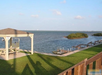 Welcome to coastal living! Beautiful gated bayfront community on South Padre Island Golf Club in Texas - for sale on GolfHomes.com, golf home, golf lot
