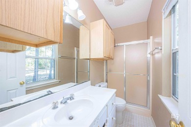 This charming tri-level has a lot of potential--1352 s.f. plus on Lake Forest Yacht and Country Club in Alabama - for sale on GolfHomes.com, golf home, golf lot