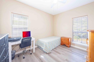 This charming tri-level has a lot of potential--1352 s.f. plus on Lake Forest Yacht and Country Club in Alabama - for sale on GolfHomes.com, golf home, golf lot