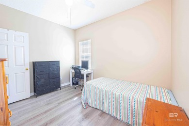 This charming tri-level has a lot of potential--1352 s.f. plus on Lake Forest Yacht and Country Club in Alabama - for sale on GolfHomes.com, golf home, golf lot