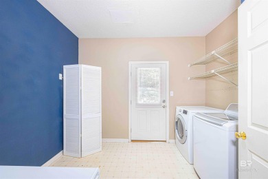 This charming tri-level has a lot of potential--1352 s.f. plus on Lake Forest Yacht and Country Club in Alabama - for sale on GolfHomes.com, golf home, golf lot