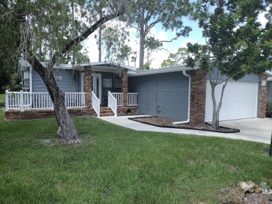 Unfurnished 2-bedroom, 2-bath manufactured home in Pine Lakes on Lake Fairways Country Club in Florida - for sale on GolfHomes.com, golf home, golf lot