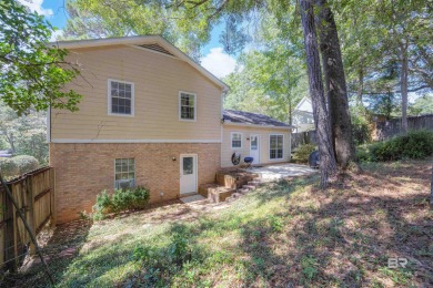 This charming tri-level has a lot of potential--1352 s.f. plus on Lake Forest Yacht and Country Club in Alabama - for sale on GolfHomes.com, golf home, golf lot