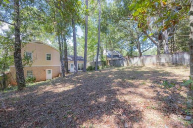 This charming tri-level has a lot of potential--1352 s.f. plus on Lake Forest Yacht and Country Club in Alabama - for sale on GolfHomes.com, golf home, golf lot