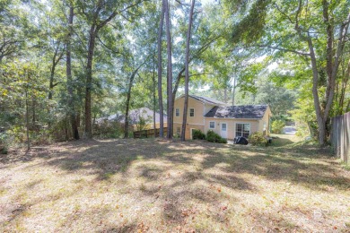 This charming tri-level has a lot of potential--1352 s.f. plus on Lake Forest Yacht and Country Club in Alabama - for sale on GolfHomes.com, golf home, golf lot