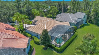 Elevated elegance meets exceptional design in this estate on The Legacy Club At Alaqua Lakes in Florida - for sale on GolfHomes.com, golf home, golf lot