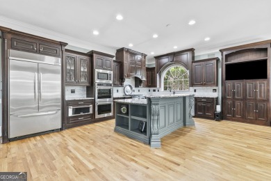 EXQUISITE LUXURY LIVING IN ST MARLO COUNTRY CLUB! This all-brick on St. Marlo Country Club in Georgia - for sale on GolfHomes.com, golf home, golf lot