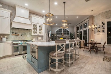 Elevated elegance meets exceptional design in this estate on The Legacy Club At Alaqua Lakes in Florida - for sale on GolfHomes.com, golf home, golf lot