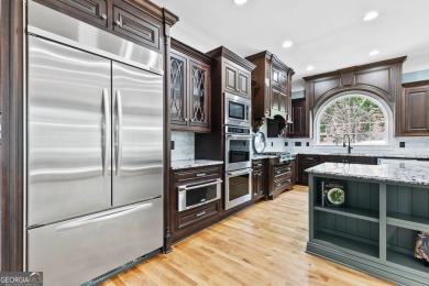 EXQUISITE LUXURY LIVING IN ST MARLO COUNTRY CLUB! This all-brick on St. Marlo Country Club in Georgia - for sale on GolfHomes.com, golf home, golf lot