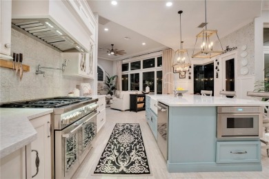 Elevated elegance meets exceptional design in this estate on The Legacy Club At Alaqua Lakes in Florida - for sale on GolfHomes.com, golf home, golf lot