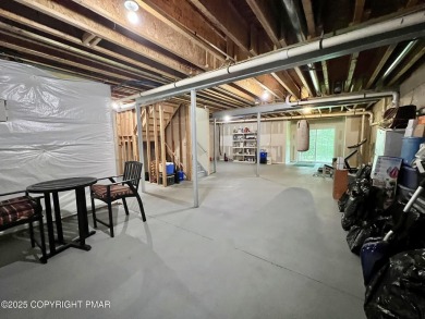 Welcome to this stunning condominium in the desirable Country on Country Club of the Poconos Golf Course in Pennsylvania - for sale on GolfHomes.com, golf home, golf lot