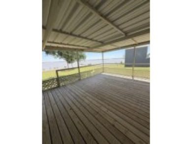 Enjoy Lake Views From This Coveted Waterfront Property on The Club At Runaway Bay in Texas - for sale on GolfHomes.com, golf home, golf lot