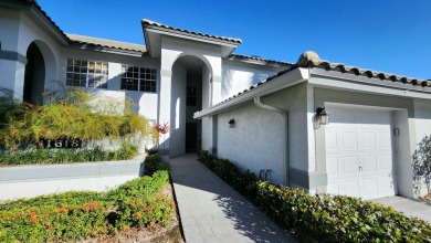 Step into a blend of modern sophistication and timeless elegance on Indian Spring Golf and Country Club in Florida - for sale on GolfHomes.com, golf home, golf lot