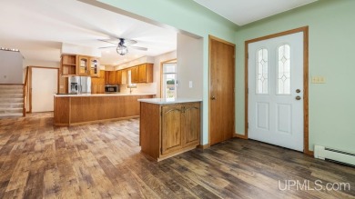 This home has had extreme care and is completely move in ready! on Escanaba Country Club in Michigan - for sale on GolfHomes.com, golf home, golf lot