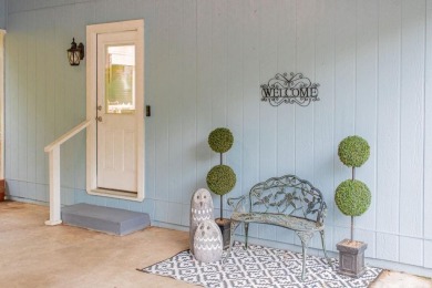 Welcome to your dream home in the serene community of Hideaway on Hide-A-Way Lake Golf Course in Texas - for sale on GolfHomes.com, golf home, golf lot