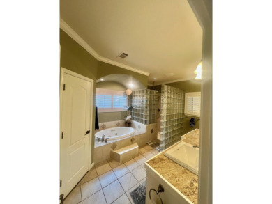 Nestled beneath an abundance of shade, located across the street on Legends Golf Course in Texas - for sale on GolfHomes.com, golf home, golf lot