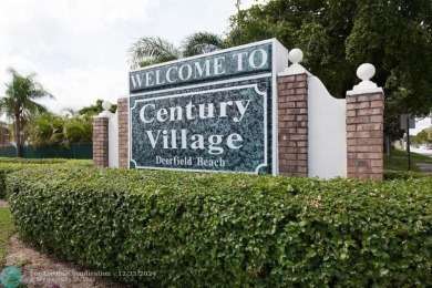AFFORDABLE WINTER GET-AWAY!! GROUND FLOOR IN MOVE-IN CONDITION on Hillsboro Pines Golf in Florida - for sale on GolfHomes.com, golf home, golf lot