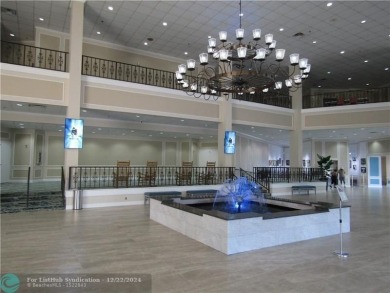 AFFORDABLE WINTER GET-AWAY!! GROUND FLOOR IN MOVE-IN CONDITION on Hillsboro Pines Golf in Florida - for sale on GolfHomes.com, golf home, golf lot