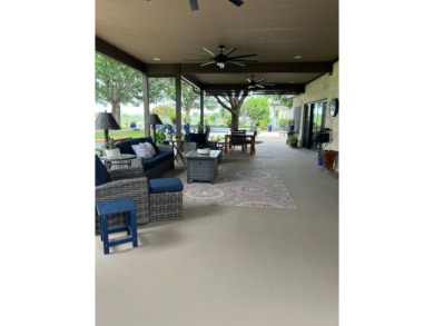 Nestled beneath an abundance of shade, located across the street on Legends Golf Course in Texas - for sale on GolfHomes.com, golf home, golf lot