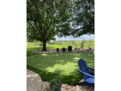 Nestled beneath an abundance of shade, located across the street on Legends Golf Course in Texas - for sale on GolfHomes.com, golf home, golf lot