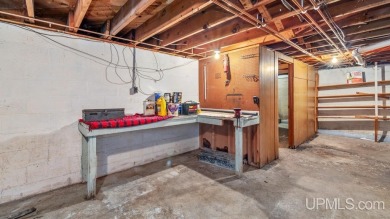 This home has had extreme care and is completely move in ready! on Escanaba Country Club in Michigan - for sale on GolfHomes.com, golf home, golf lot