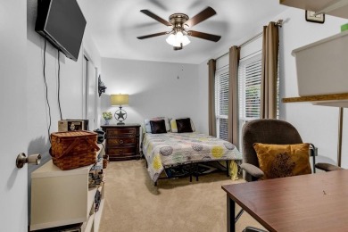 Welcome to your dream home in the serene community of Hideaway on Hide-A-Way Lake Golf Course in Texas - for sale on GolfHomes.com, golf home, golf lot