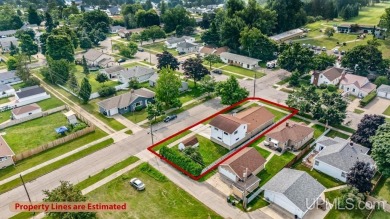 This home has had extreme care and is completely move in ready! on Escanaba Country Club in Michigan - for sale on GolfHomes.com, golf home, golf lot