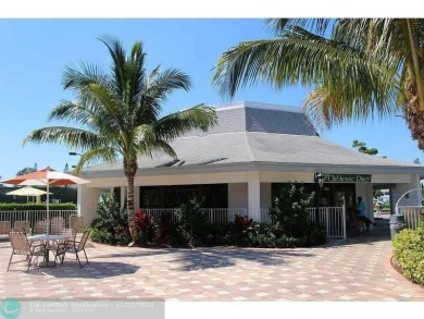 AFFORDABLE WINTER GET-AWAY!! GROUND FLOOR IN MOVE-IN CONDITION on Hillsboro Pines Golf in Florida - for sale on GolfHomes.com, golf home, golf lot