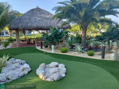 AFFORDABLE WINTER GET-AWAY!! GROUND FLOOR IN MOVE-IN CONDITION on Hillsboro Pines Golf in Florida - for sale on GolfHomes.com, golf home, golf lot