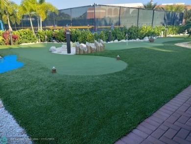 AFFORDABLE WINTER GET-AWAY!! GROUND FLOOR IN MOVE-IN CONDITION on Hillsboro Pines Golf in Florida - for sale on GolfHomes.com, golf home, golf lot
