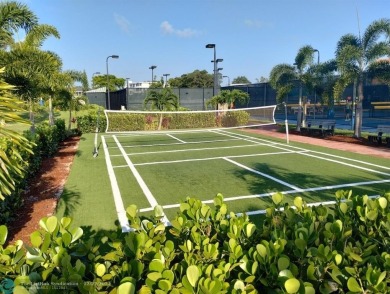 AFFORDABLE WINTER GET-AWAY!! GROUND FLOOR IN MOVE-IN CONDITION on Hillsboro Pines Golf in Florida - for sale on GolfHomes.com, golf home, golf lot