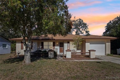 Welcome home! This delightful 3-bedroom, 2-bathroom, and 1-car on Citrus Springs Country Club in Florida - for sale on GolfHomes.com, golf home, golf lot