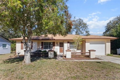 Welcome home! This delightful 3-bedroom, 2-bathroom, and 1-car on Citrus Springs Country Club in Florida - for sale on GolfHomes.com, golf home, golf lot