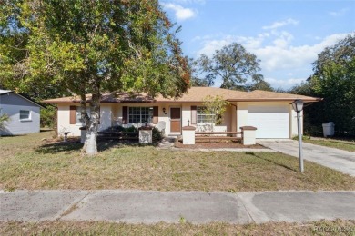 Welcome home! This delightful 3-bedroom, 2-bathroom, and 1-car on Citrus Springs Country Club in Florida - for sale on GolfHomes.com, golf home, golf lot