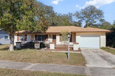 Welcome home! This delightful 3-bedroom, 2-bathroom, and 1-car on Citrus Springs Country Club in Florida - for sale on GolfHomes.com, golf home, golf lot