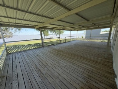 Enjoy Lake Views From This Coveted Waterfront Property on The Club At Runaway Bay in Texas - for sale on GolfHomes.com, golf home, golf lot